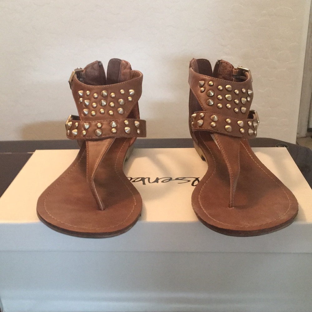 Cognac spiked/studded thong sandals.
